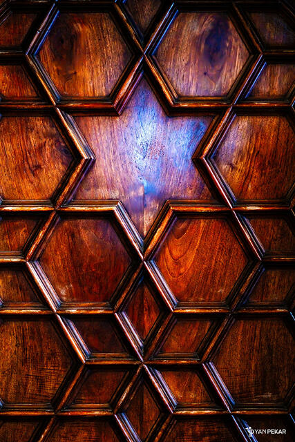 Some houses in Barcelona have a rotated Magen David on their entrance door.